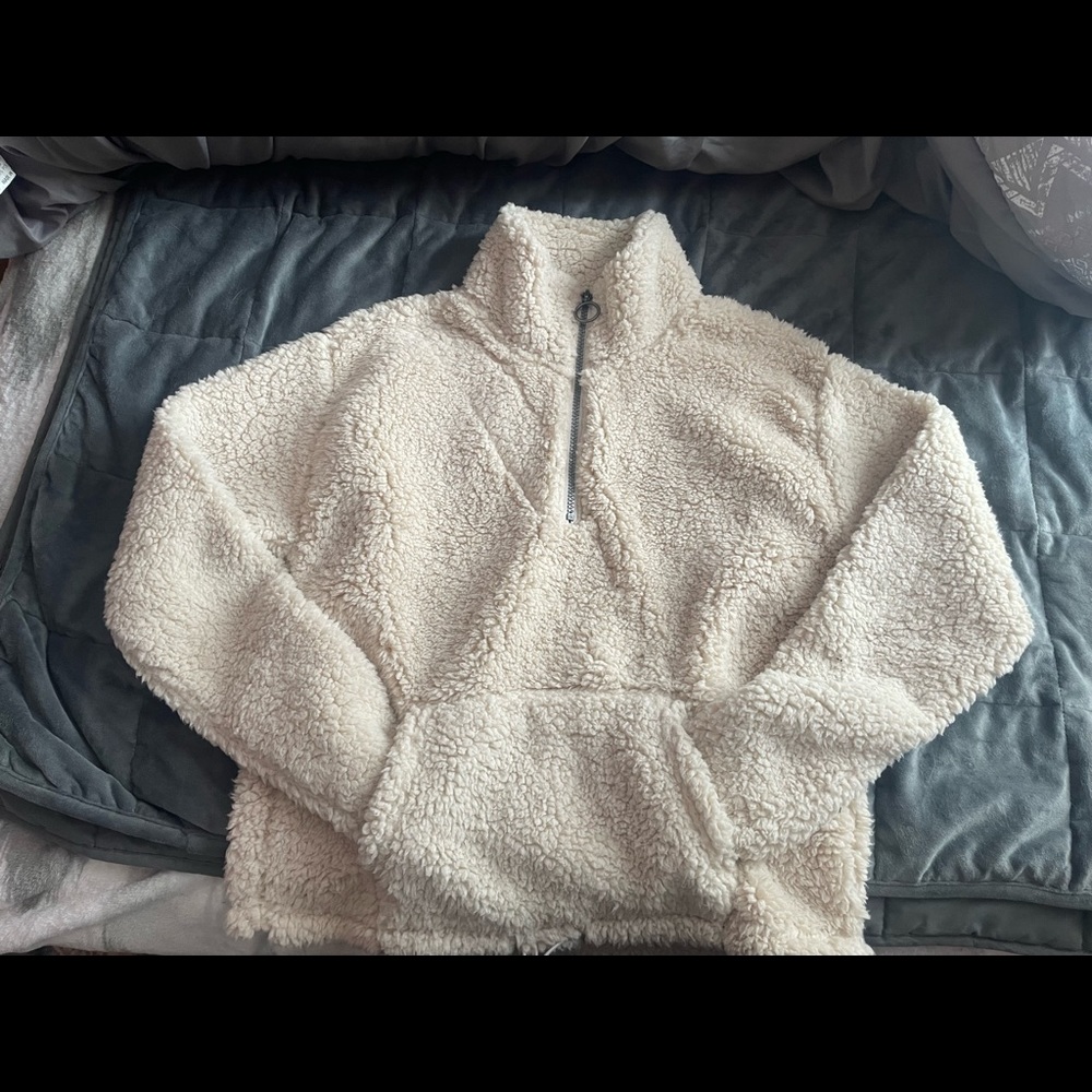 fuzzy cream colored hoodie